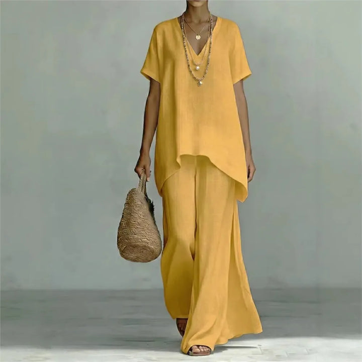 Chic women's summer linen blend two piece set including a comfortable top and elegant wide-leg pants.