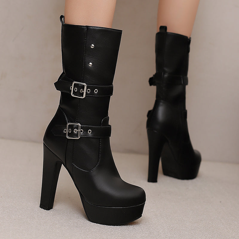 Women's fashion mid-calf boots with prominent double buckles, angled view, winter footwear