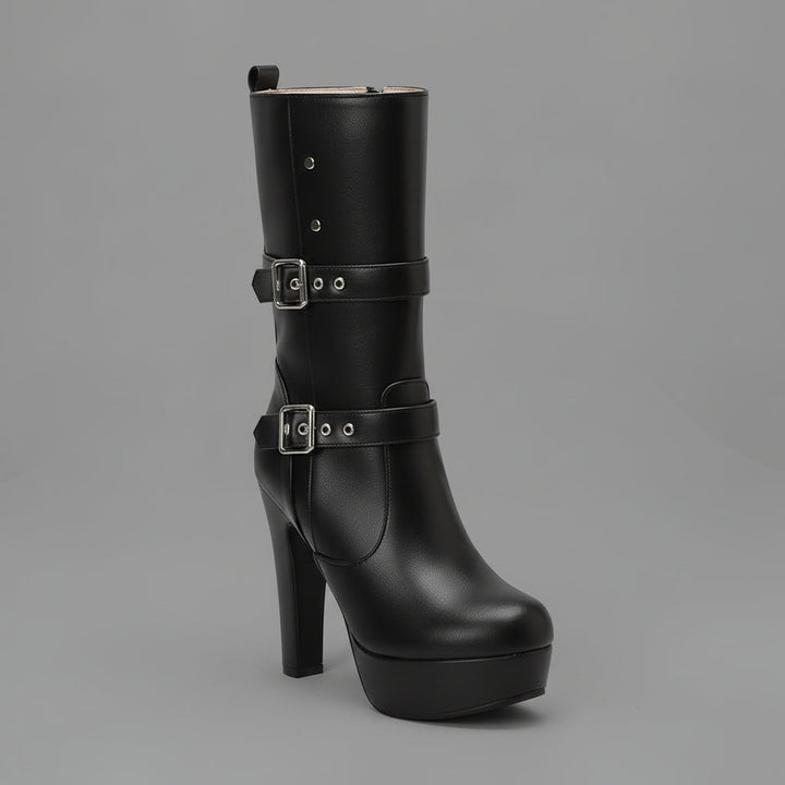 Model wearing women's heeled buckle boots with casual outfit, mid-calf height, full shot