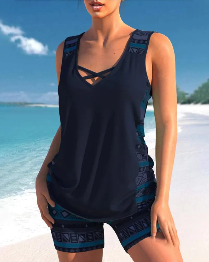 Chic women's tankini swimsuit with tummy control and adjustable straps for a flattering & comfortable summer look.