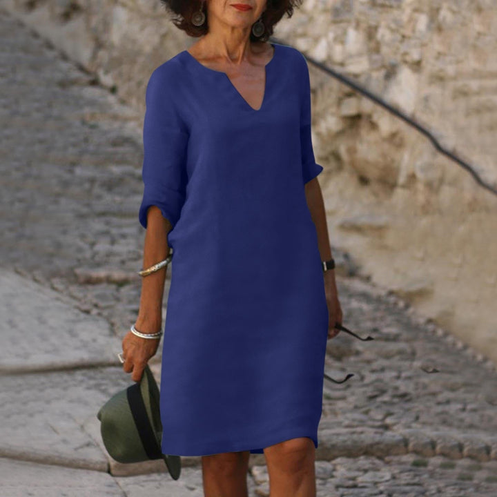 Back view of a comfortable women's V-neck midi dress, perfect for summer casual & party wear.