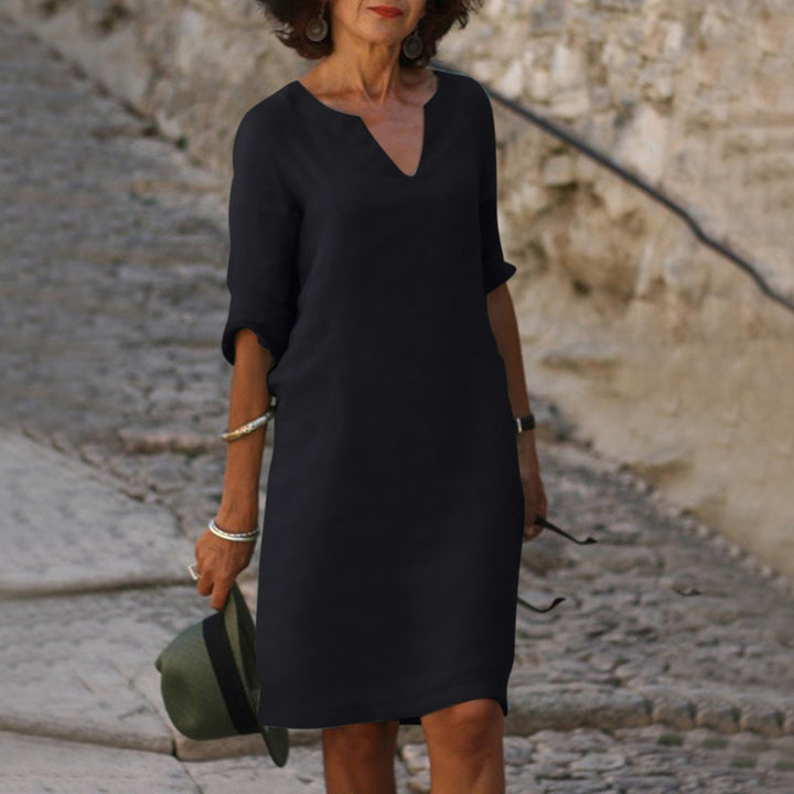 Stylish V-neck midi dress for women, perfect for summer parties, casual wear, or vacation.
