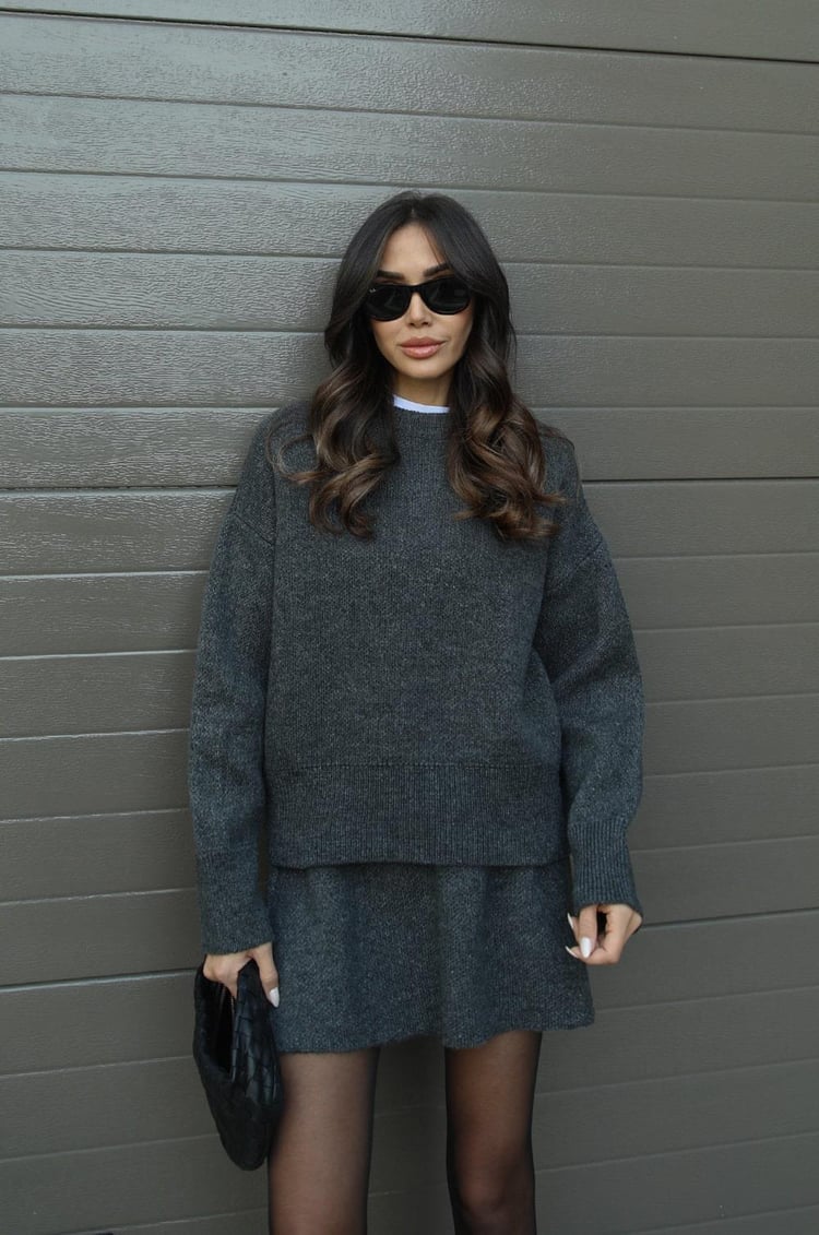 Chic women's sweater knit mini skirt set, ideal for a fashionable spring outfit