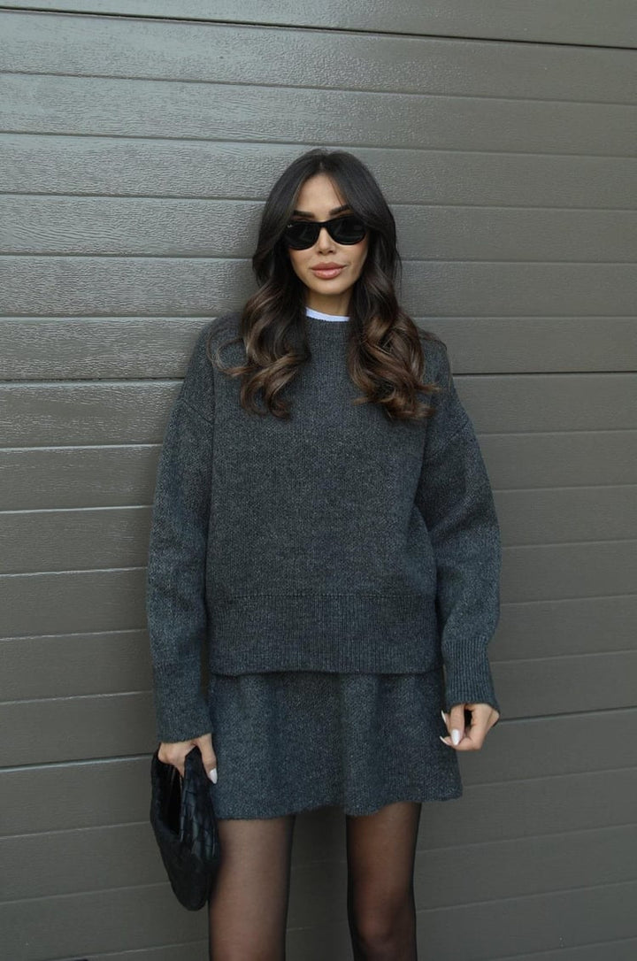 Chic women's sweater knit mini skirt set, ideal for a fashionable spring outfit