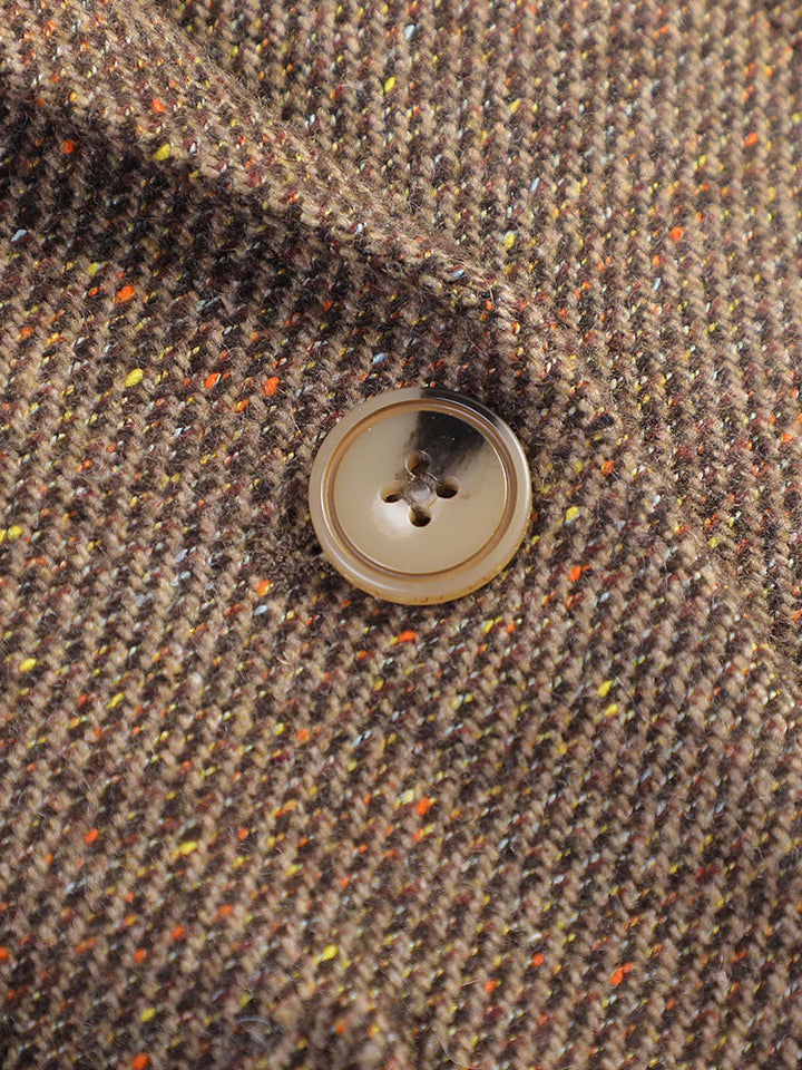 Fashionable women's grey cotton blazer, tailored fit, a staple for any business casual wardrobe
