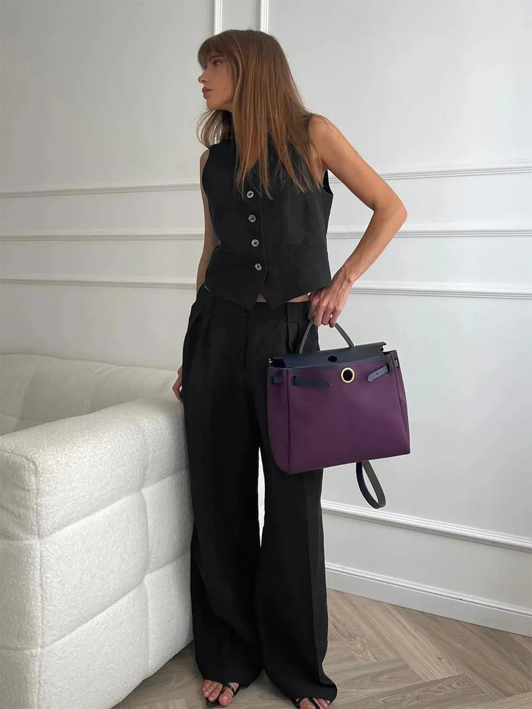 Versatile women's tailored waistcoat and wide leg trousers. Chic pant set for elegant office or casual summer looks.