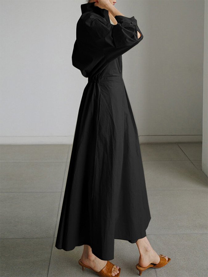 Elegant women's midi dress with a V-neck, A-line cut, and practical pockets for a flattering look.