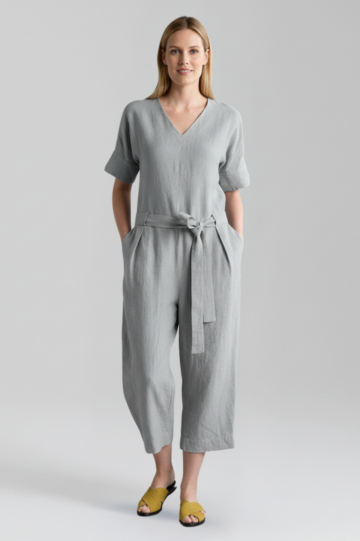 Front view of a women's V-neck long sleeve wide leg jumpsuit, showcasing its modern and flattering design.