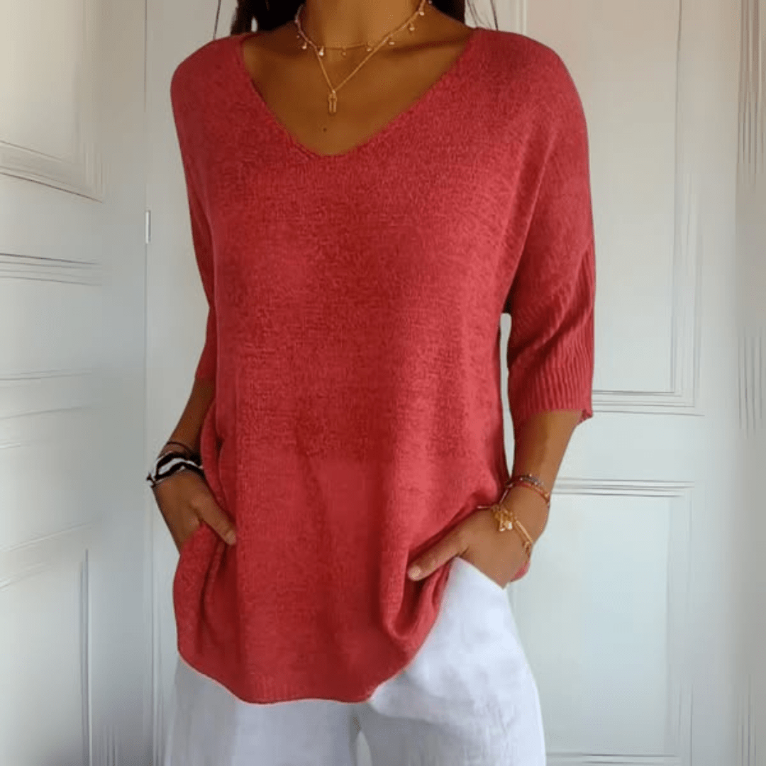 Women's V-neck loose fit sweater, perfect for casual comfort & versatile everyday wear.