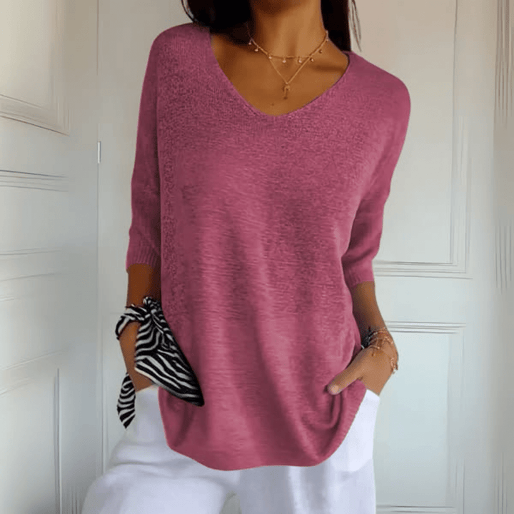 Versatile women's V-neck sweater, loose fit & 3/4 sleeves for ultimate comfort & style.