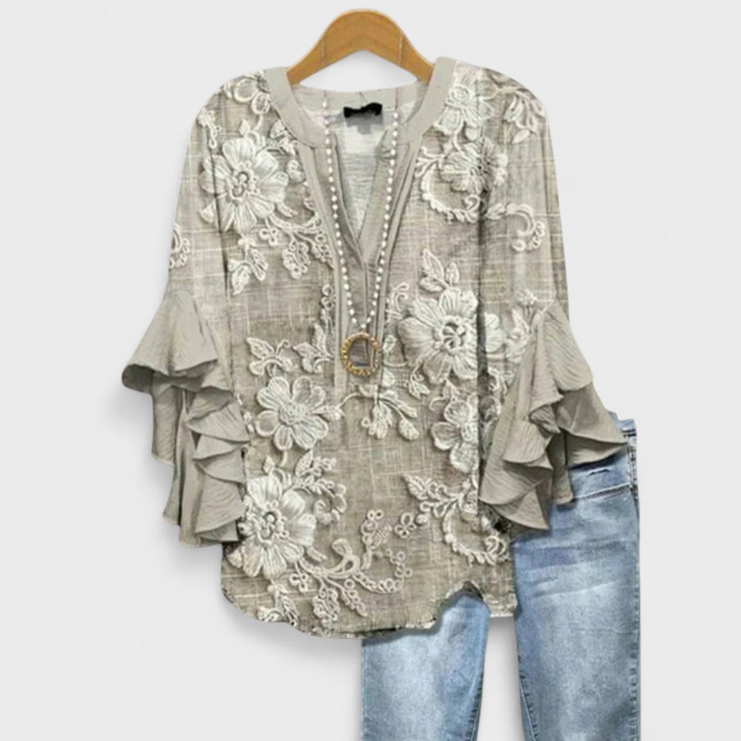Versatile women's V-neck blouse with ruffle sleeves, suitable for office or casual outings.