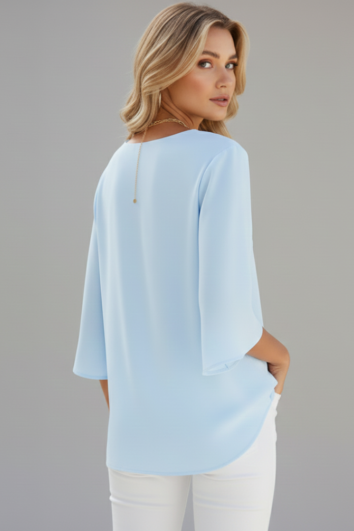 Women's stylish V-neck short sleeve top, a comfortable and versatile casual blouse for any day.
