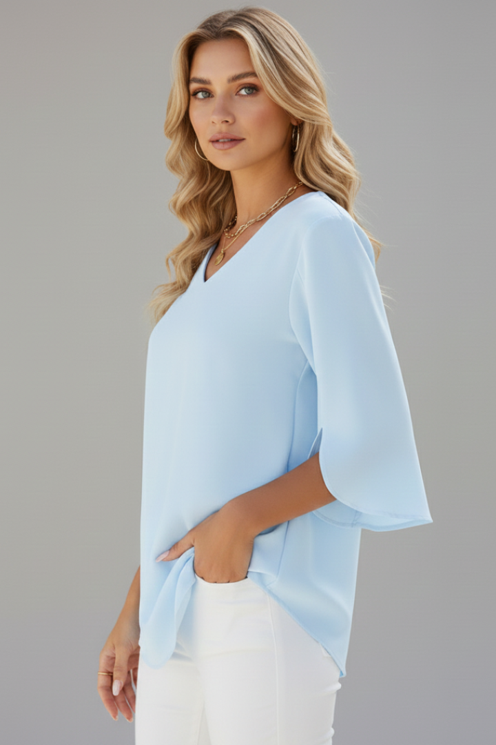 Chic women's V-neck short sleeve blouse in a relaxed fit, ideal for elegant casual daily wear.
