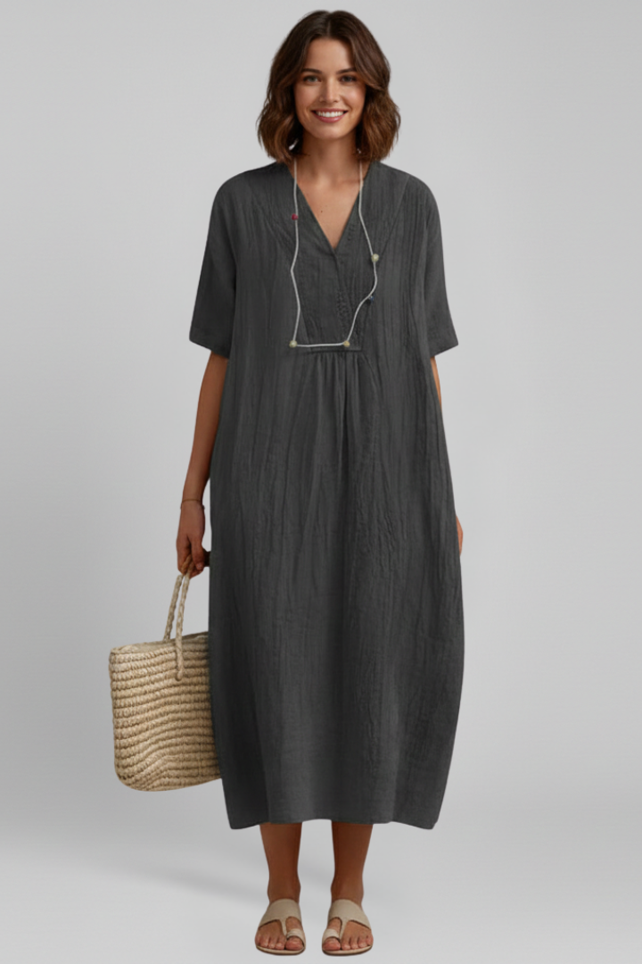 Everyday women's V-neck spotted dress, short sleeve. Comfortable fit & flare, perfect for casual style.