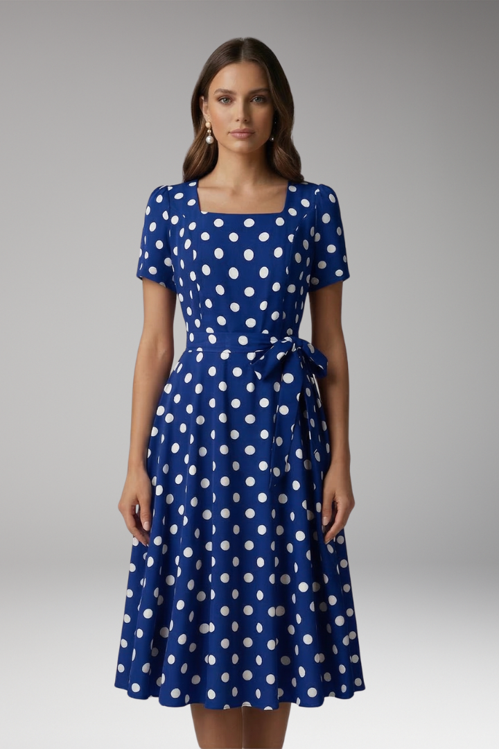 Casual women's short sleeve V-neck spotted dress. Comfortable fit & flare, knee-length for summer fashion.