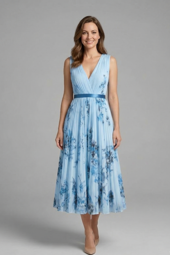 Summer V-neck sleeveless pleated midi dress for women, offering a relaxed yet refined look.