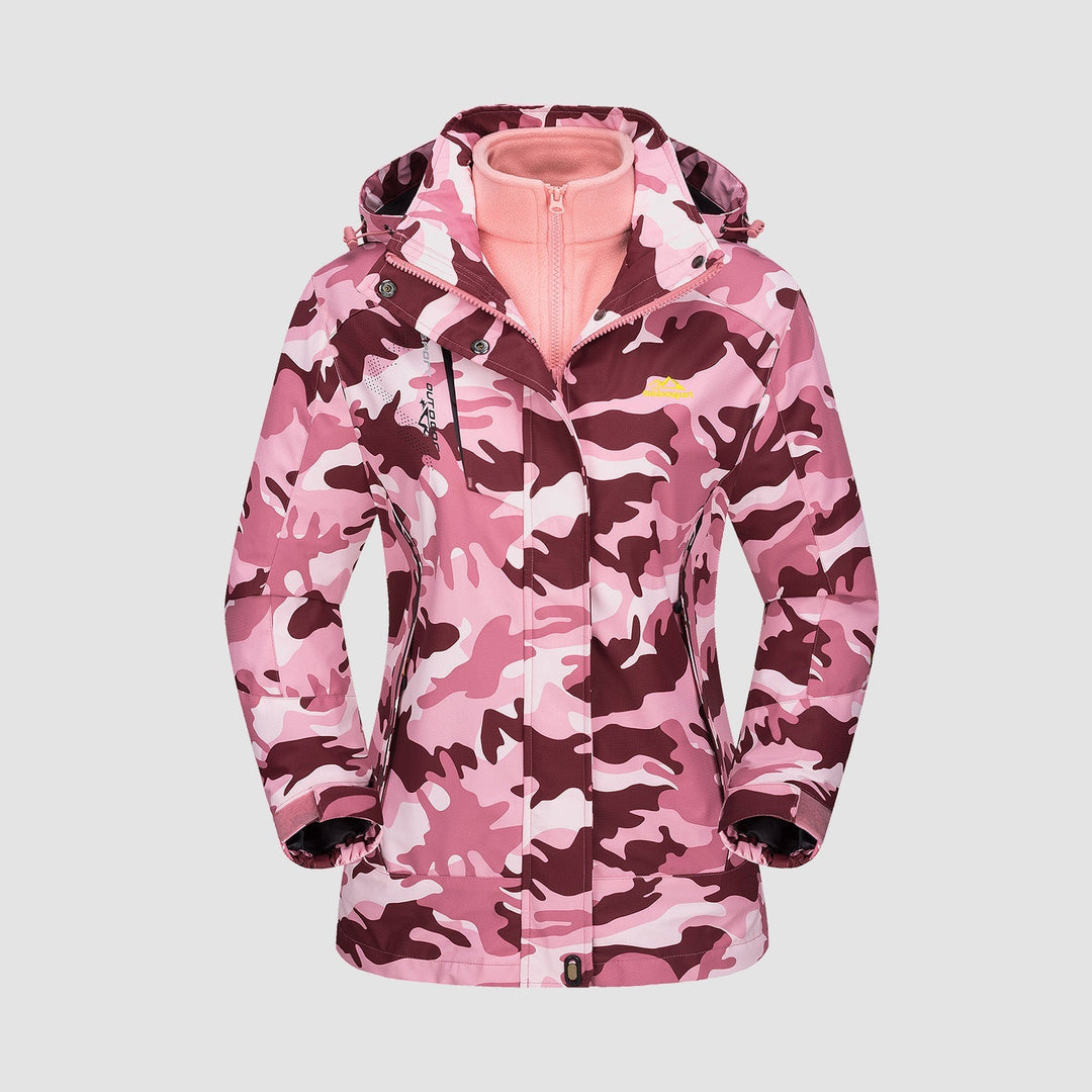 Woman zipping up her Verona 3-in-1 waterproof jacket, showing comfort and ease of use in winter.