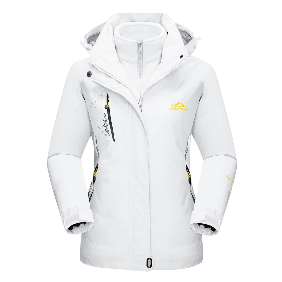 Outdoor shot of a woman hiking in a grey Verona 3-in-1 waterproof jacket, perfect fall & winter coat.