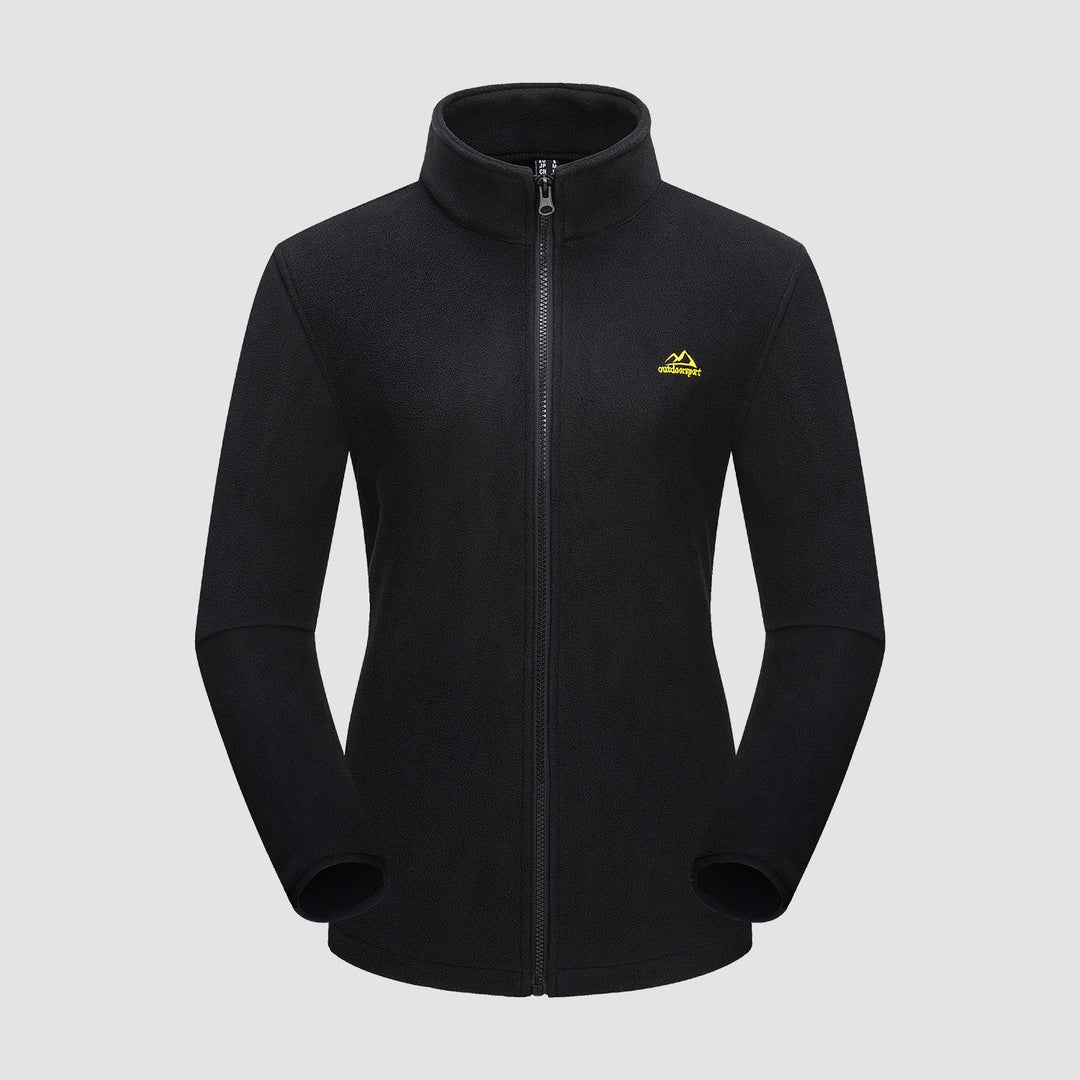 The Verona 3-in-1 women's jacket in a deep forest green, blending with nature, perfect outdoor wear.