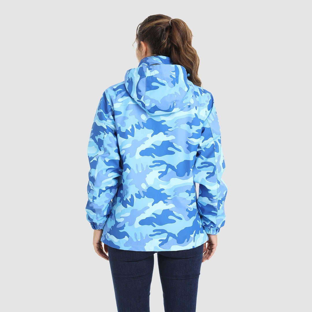 Woman running errands, stylish and dry in her Verona 3-in-1 waterproof jacket, essential outerwear.