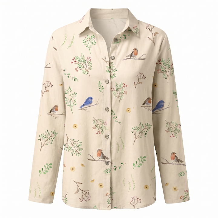 Modern women's abstract print split neck blouse, a must-have long sleeve top.