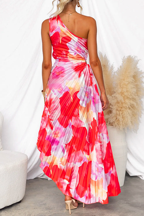 Elegant asymmetric pleated gown for women, showcasing a beautiful vibrant print and a chic one-shoulder style.