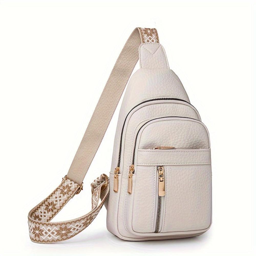 Women's retro leather shoulder bag, an essential vintage fashion accessory for any outfit.
