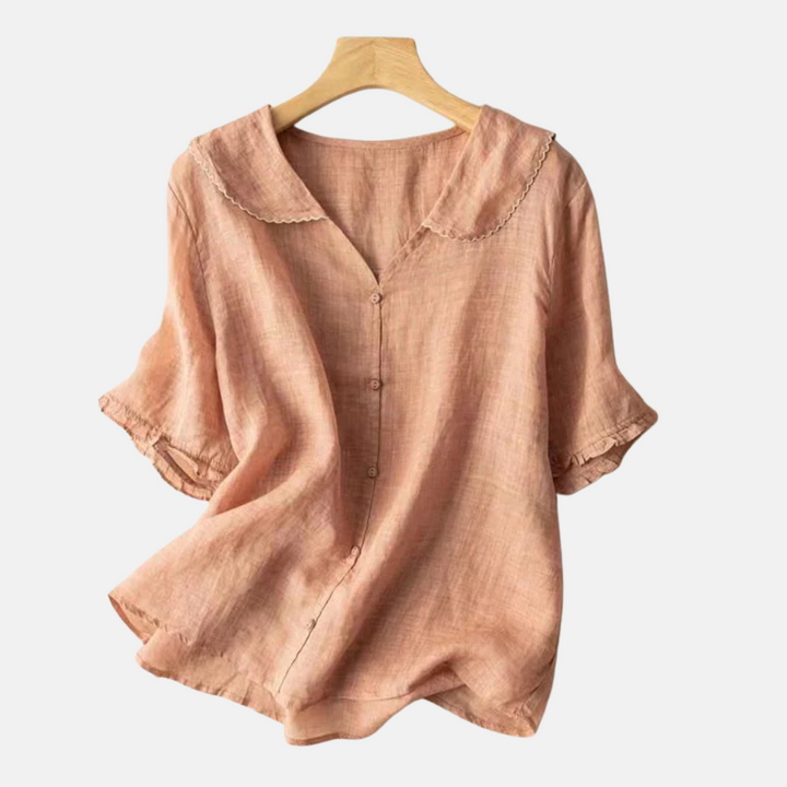 Women's vintage doll collar blouse with short sleeves, offering elegant, casual chic for spring/summer fashion.