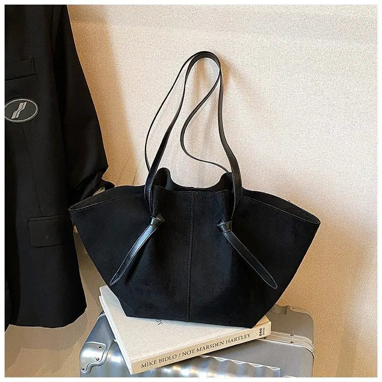Women's vintage style tote handbag in faux suede, perfect as a chic everyday shoulder bag