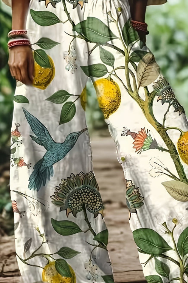 Casual summer floral cropped pants for women, soft and flowing fabric.