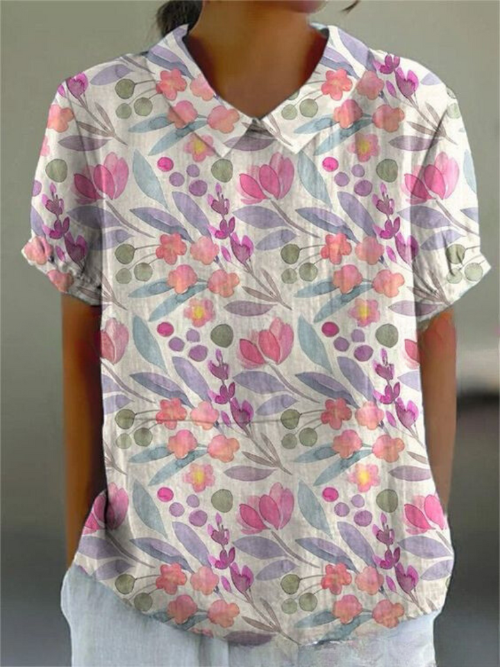 Vintage inspired women's blouse, beautiful floral embroidery & short sleeves for summer.