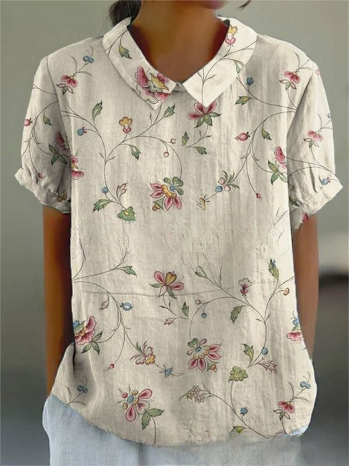 Embroidered floral women's vintage style top, short sleeve, perfect for casual elegance.