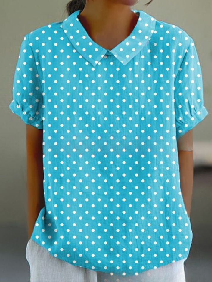 Women's relaxed fit summer blouse, vintage floral embroidery, comfortable & stylish.