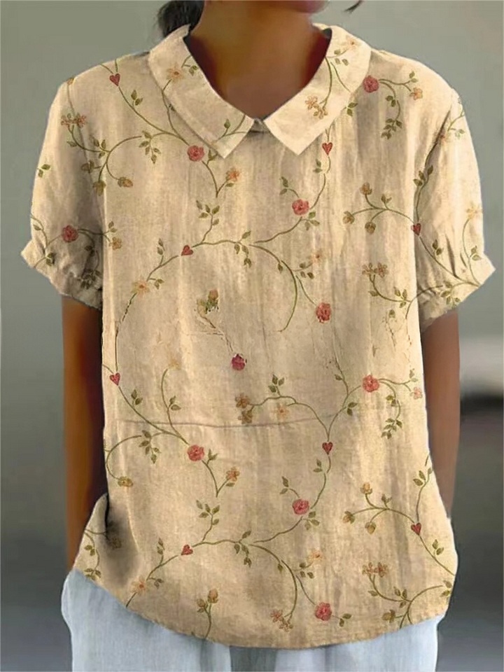 Elegant short sleeve blouse for women, featuring intricate vintage floral embroidery.
