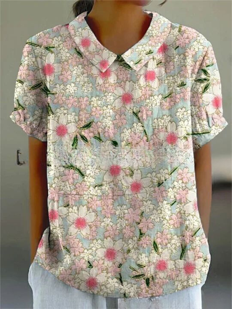 Delicate floral embroidered women's short sleeve top, vintage aesthetic, summer chic.