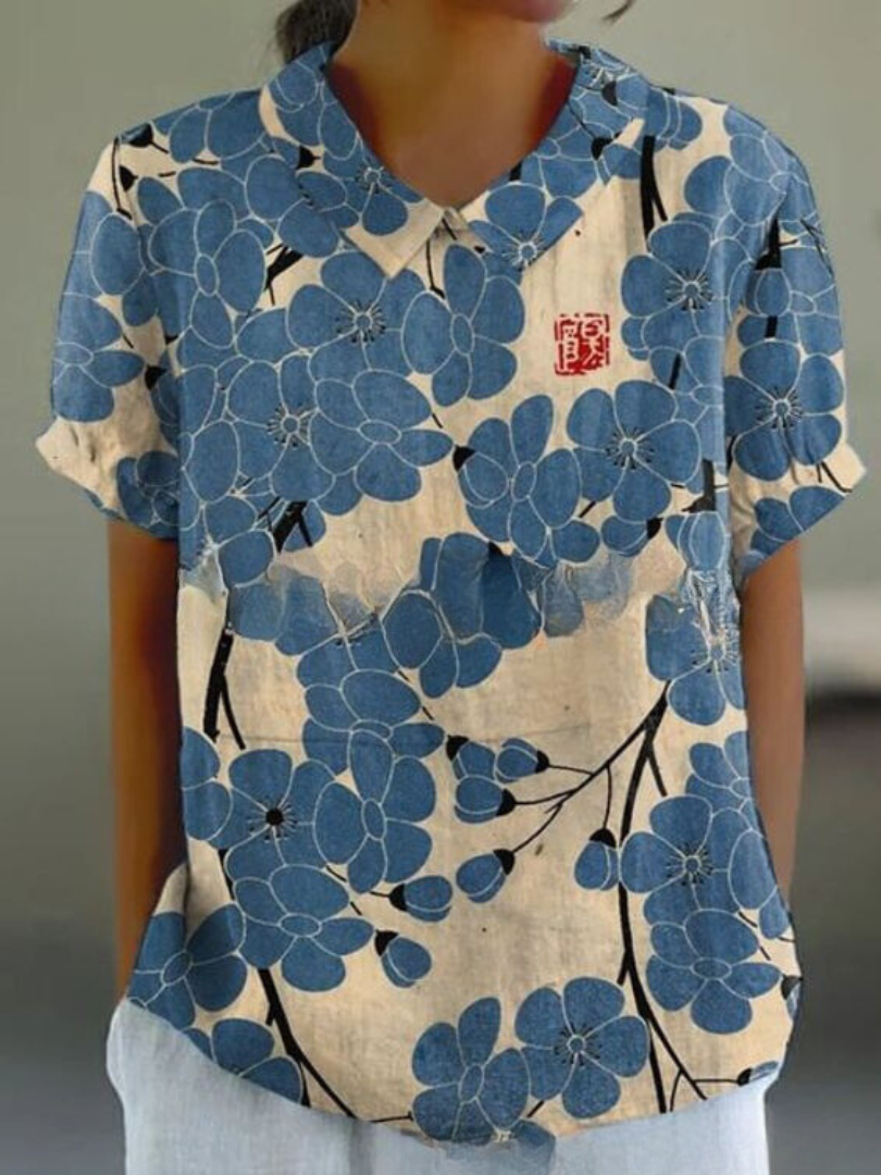 Summer-ready women's top: short sleeve, relaxed fit, vintage floral embroidery design.