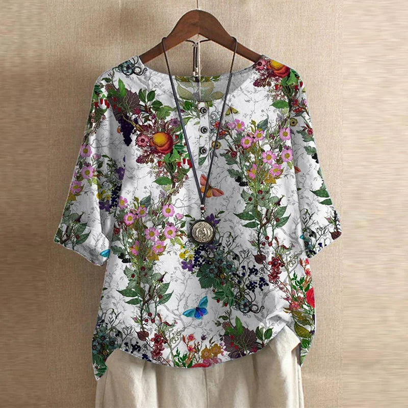 Casual women's long sleeve top with a beautiful vintage floral print and a comfortable loose fit.