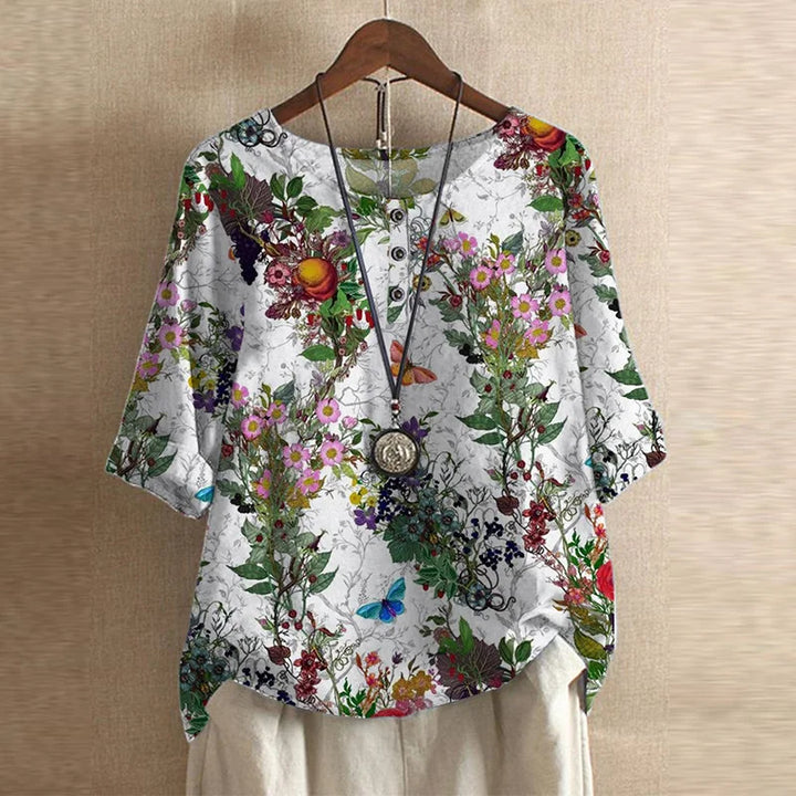 Casual women's long sleeve top with a beautiful vintage floral print and a comfortable loose fit.