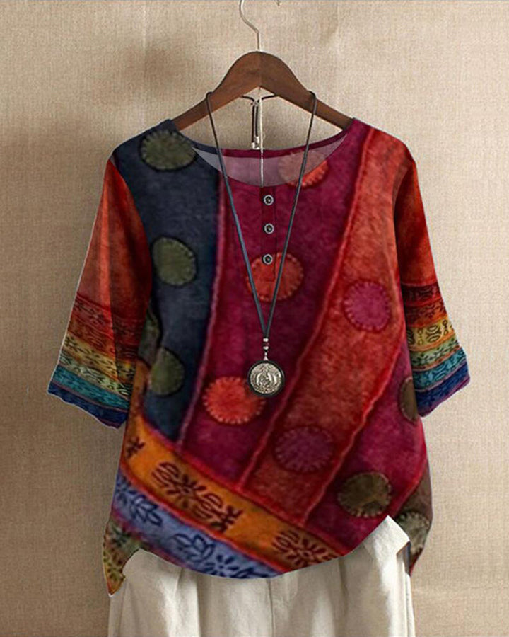 Women's vintage patchwork print tunic blouse with relaxed fit & three-quarter sleeves for bohemian style.