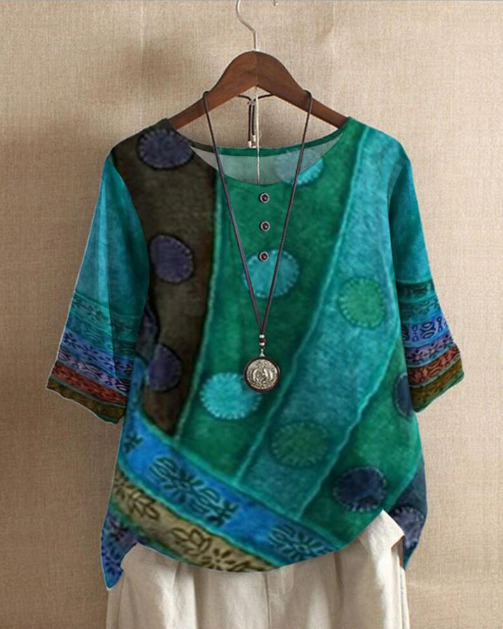 Casual women's relaxed fit tunic top with vibrant vintage patchwork print, perfect for spring/summer.