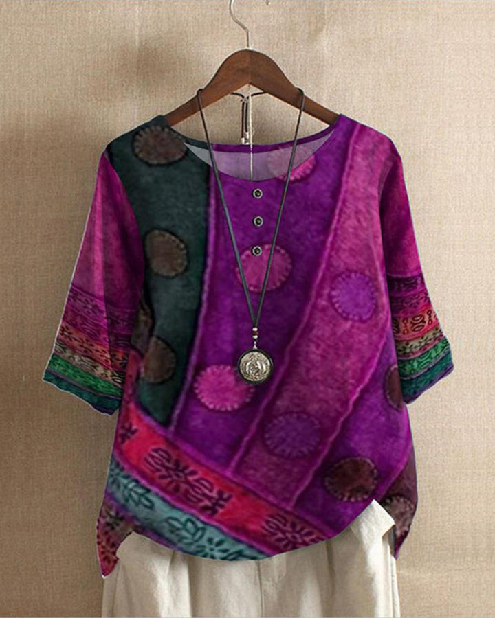 Bohemian women's vintage patchwork print tunic blouse, featuring round neck & button detail, relaxed fit.