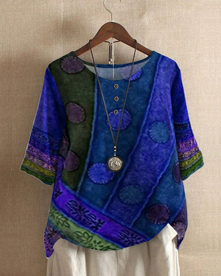 Oversized women's tunic blouse with vintage patchwork print & relaxed fit, ideal for casual travel fashion.
