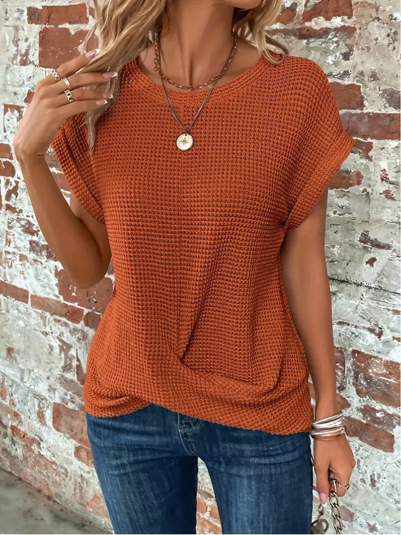 Modern women's twist front waffle tee. A stylish short-sleeve blouse, ideal for comfortable casual wear.