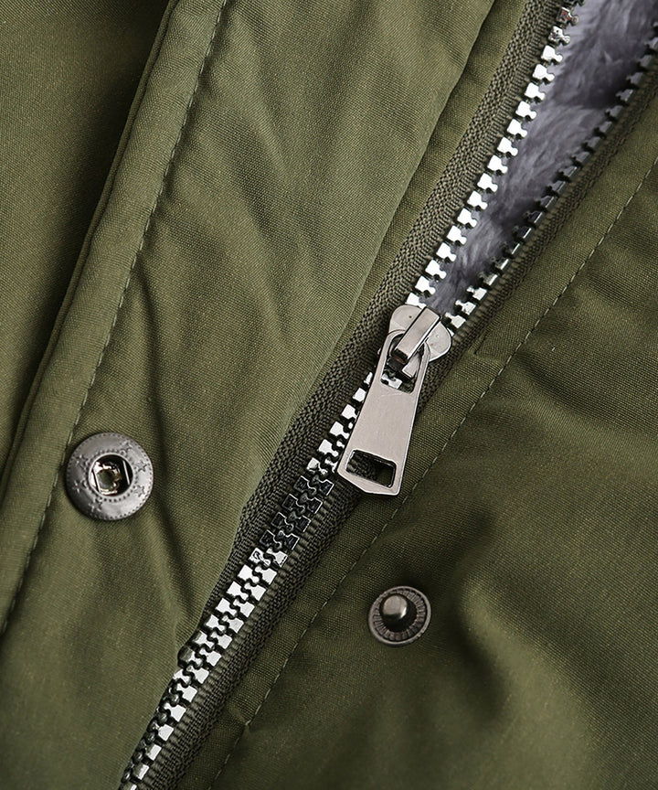 Detail of the durable fabric and stitching on a women's winter parka coat