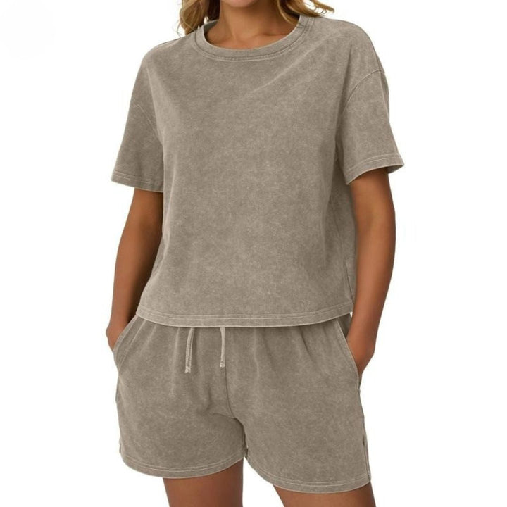 Woman relaxing in a comfortable washed cotton lounge set, ideal for summer loungewear