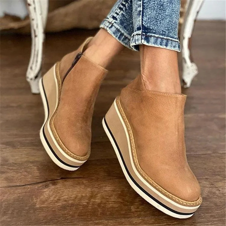 Women's waterproof ankle boots with side zipper, perfect for winter & fall comfort and style.