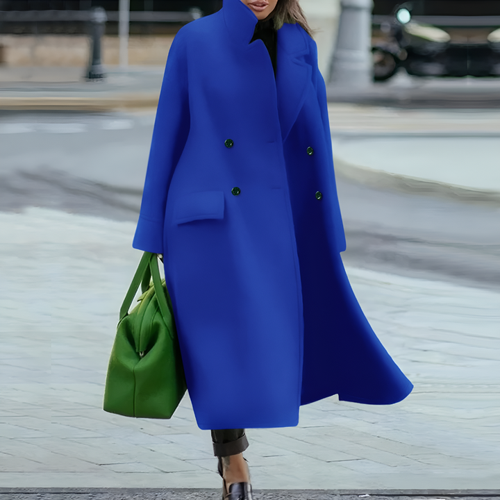 Durable women's waterproof long coat, providing excellent weather protection as a raincoat.