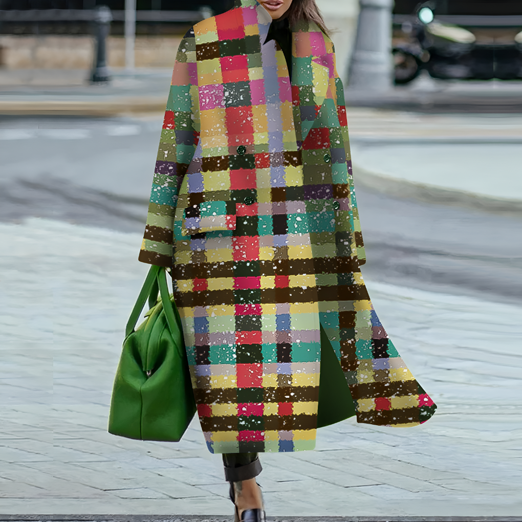 Chic women's long waterproof raincoat with button closure, great for everyday outerwear.