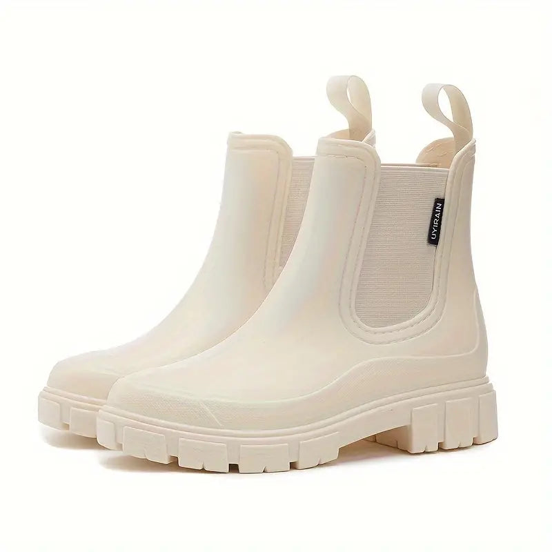 Close-up of a women's slip-on Chelsea boot in waterproof material, showcasing the detailed elastic gusset.