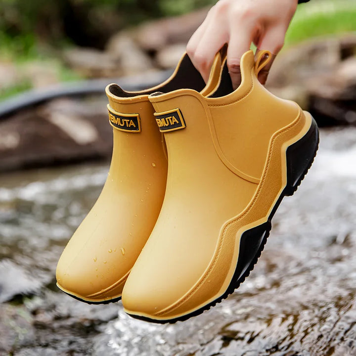Durable women's all-weather boots, waterproof with convenient slip-on style, perfect for trails